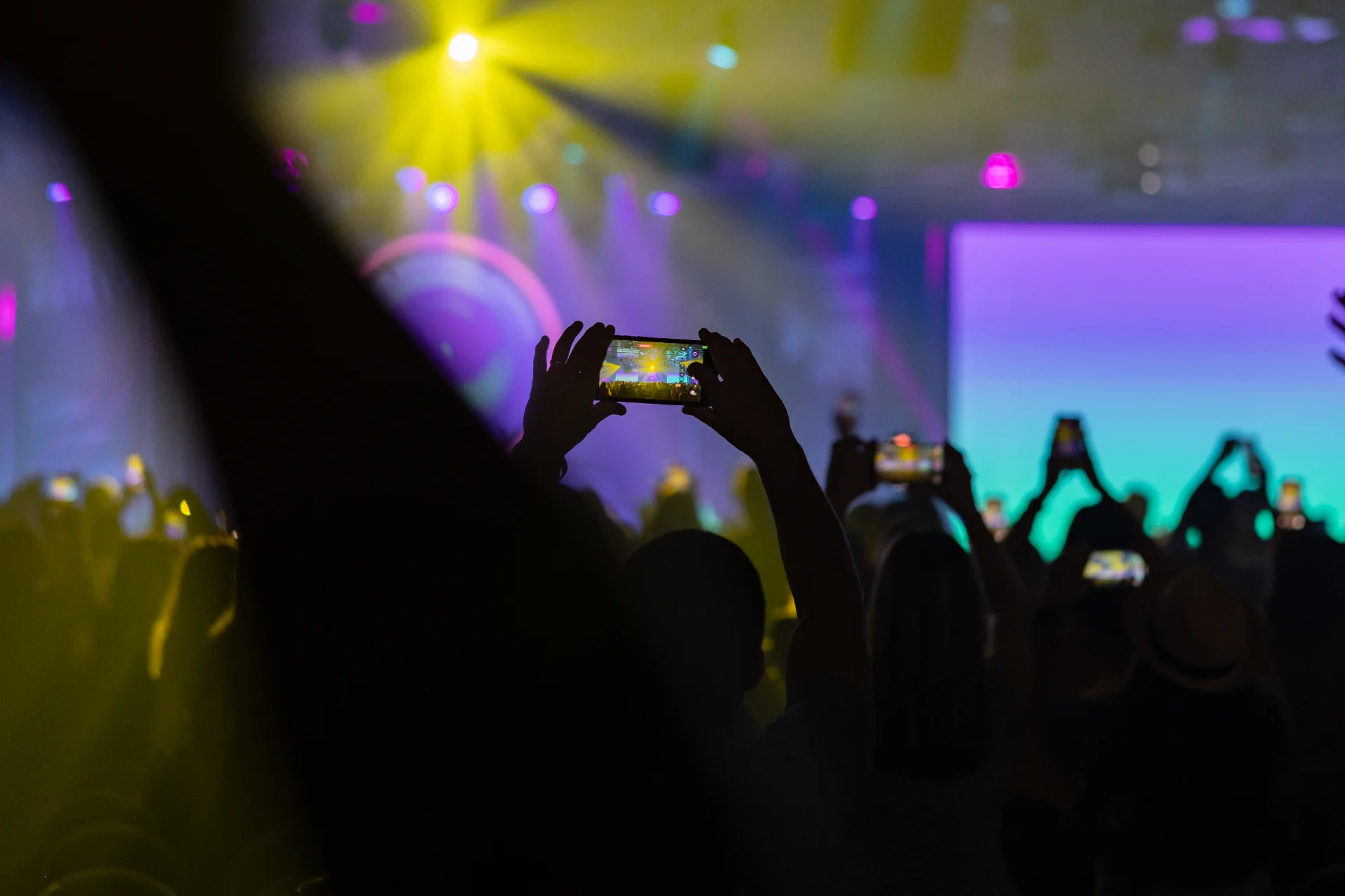 Attendees capturing the energy of an eXp event