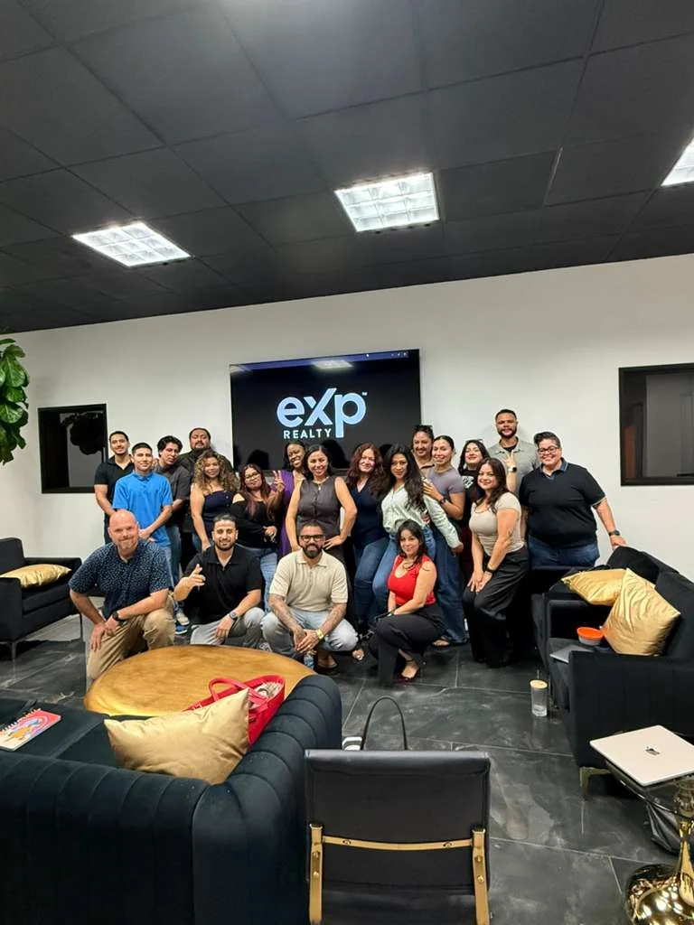 Beyond agents gathered in an eXp office lounge